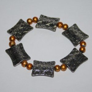 Beautiful silver and orange bracelet